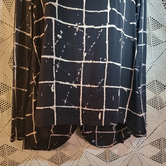 Versona size medium black cream lines with flaps in back. Long sleeve. - Picture 2 of 13